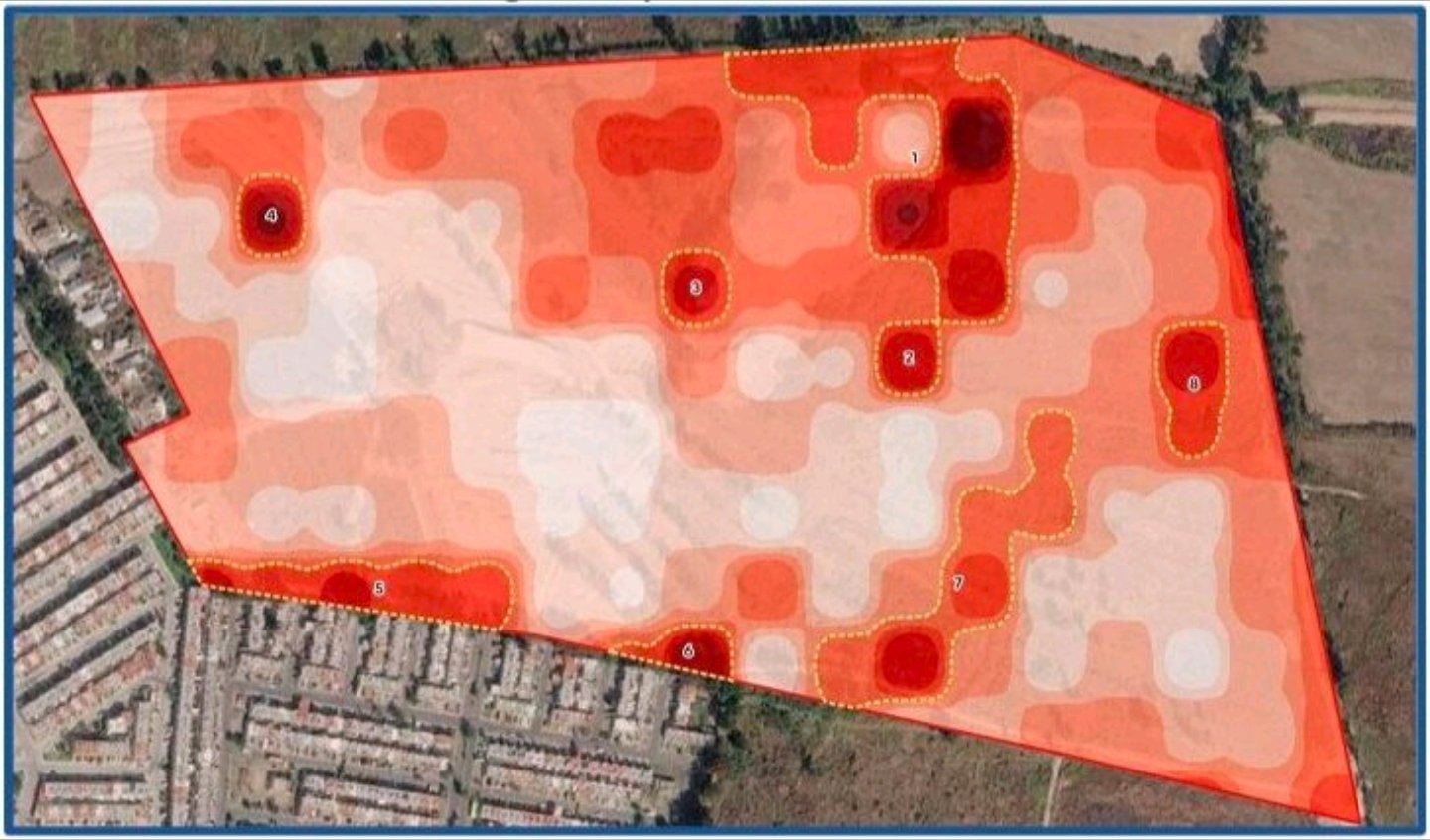 Heatmap over satellite imagery marking numbered points of interest across a search site