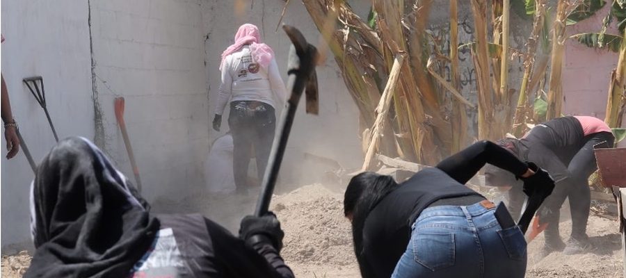 Searching mothers digging with shovels at a site in Jalisco